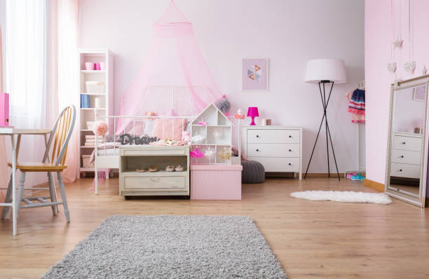 istock Spacious girl bedroom in pink 641272718