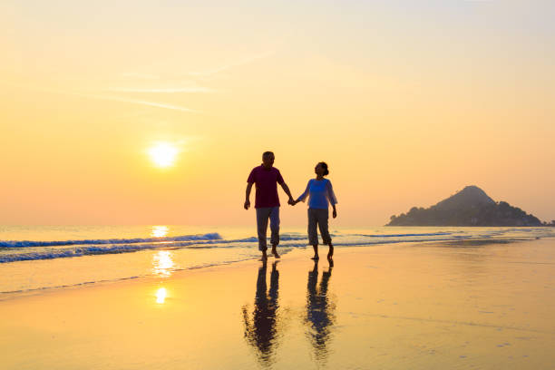 istock Senior couple at golden beach 641272922