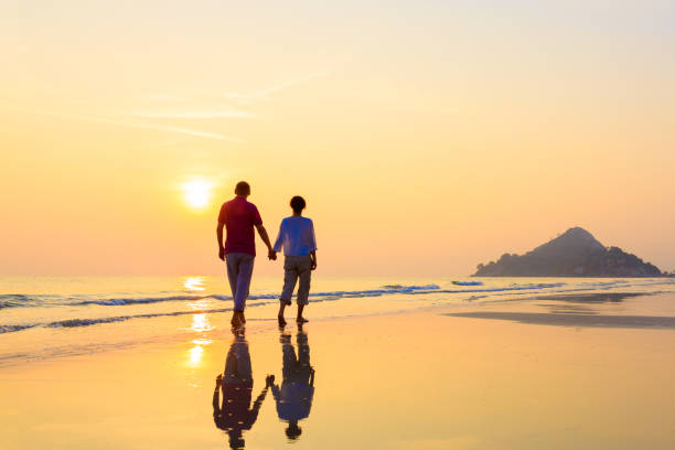 istock Senior couple at golden beach 641273342