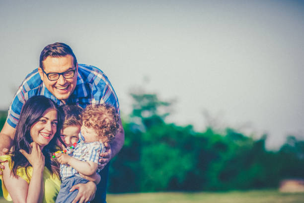 istock Parents and children on vacation playing together 641277260