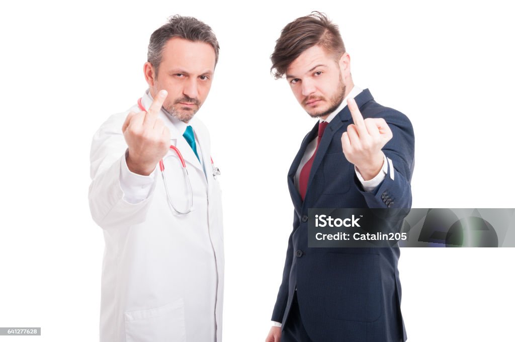 Doctor and lawyer doing rude gesture Doctor and lawyer doing rude gesture with middle finger isolated on white Doctor Stock Photo