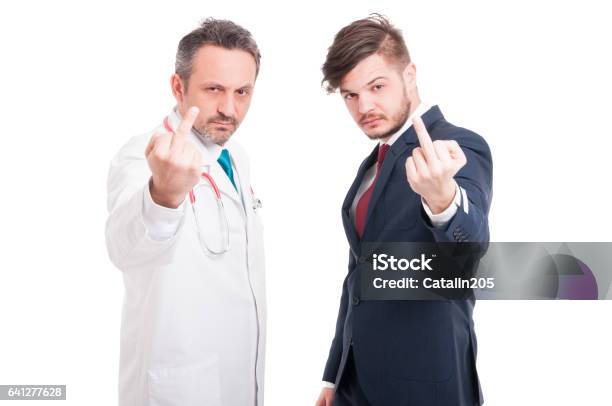 Doctor And Lawyer Doing Rude Gesture Stock Photo - Download Image Now - Doctor, Lawyer, Business Person