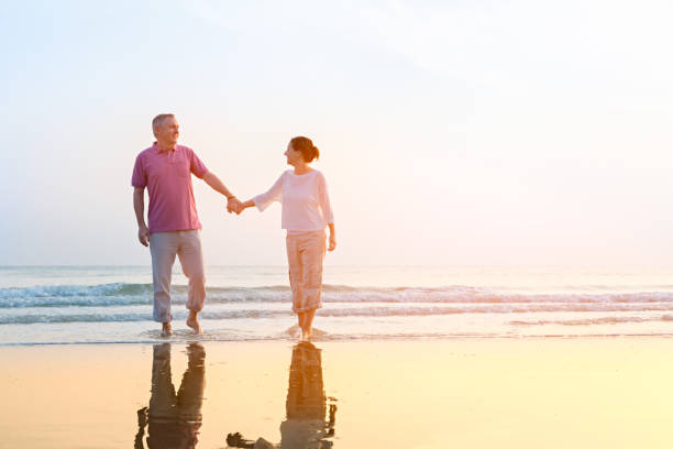 istock Senior couple at beach 641278692
