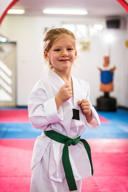 istock Taekwondo training for little girls 641279268