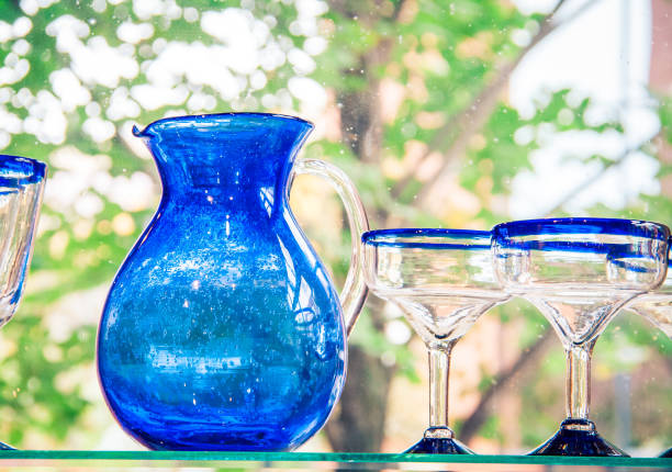 istock blue water jug and glasses 641283308