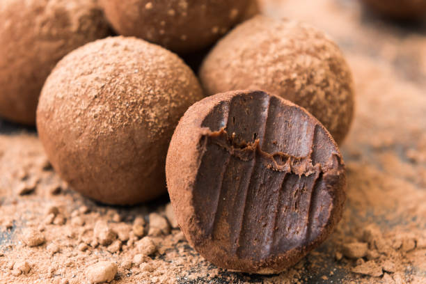 Homemade energy balls with chocolate Homemade fresh energy balls with chocolate chocolate truffle stock pictures, royalty-free photos & images