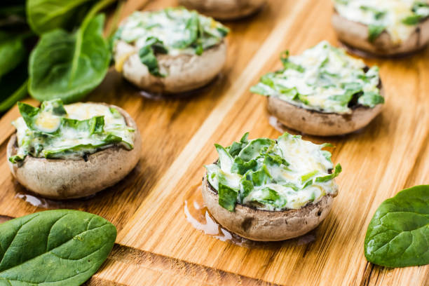 istock Fresh mushrooms with spinach and cheese 641286214