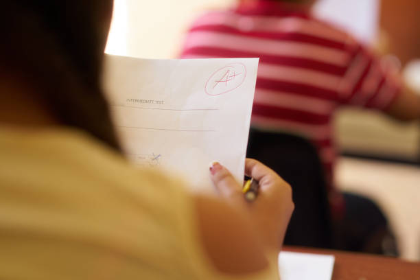 istock Papers With Good Grades For Smart Student At School 641286402