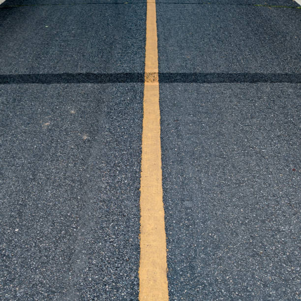 istock Perspective of Asphalt road with yellow line 641287026