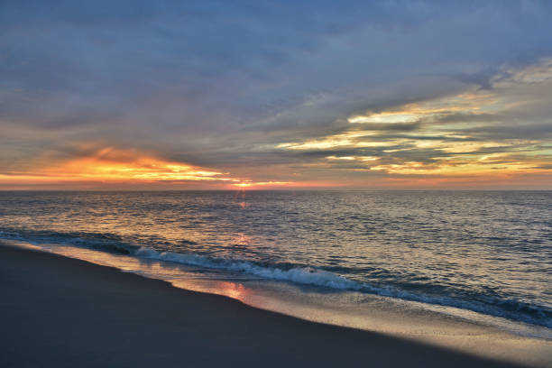 istock Golden and Glowing Seashore Sunrise 641291288