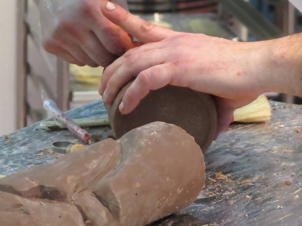 istock Hands cut out a sculpture from a chocolate 641292560