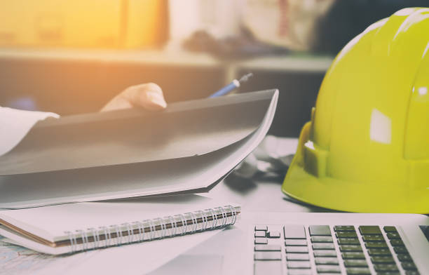 Construction engineer office working desk stock photo