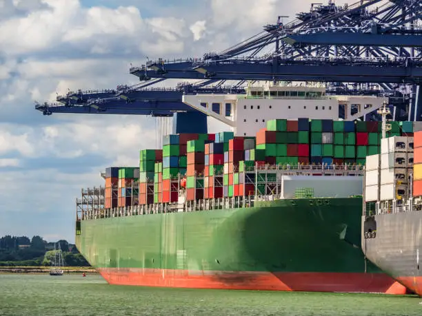 Photo of Green container ship in the port of Felixtowe