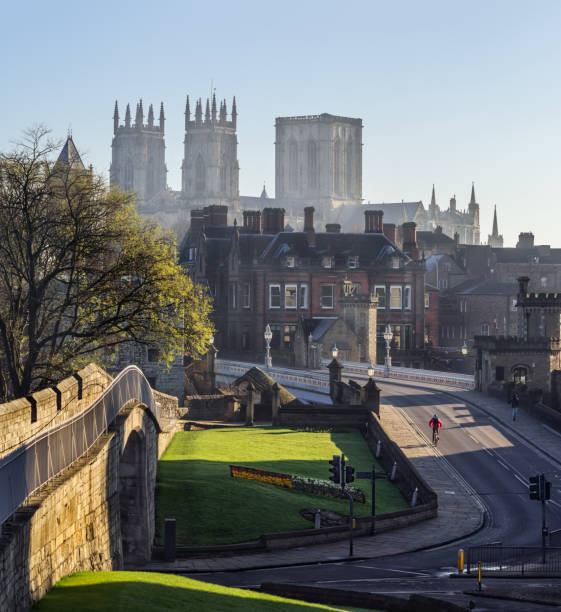 istock York Minster and bridge in calm sunny morning 641295182