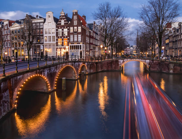 Amsterdam canals and bridges in the evening stock photo