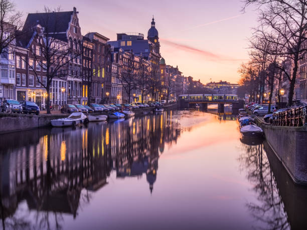 Amsterdam Keizersgracht canal and bridge in the morning stock photo