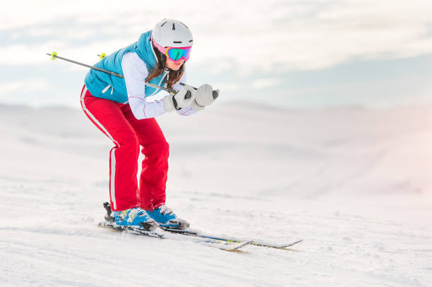 istock Girl skier in downhill position 641297282