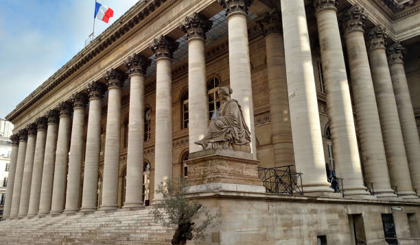 The Bourse with French flag Marais district Paris France stock photo