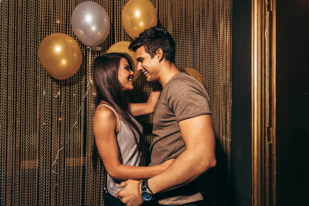 Shot of an affectionate young couple partying in a nightclub