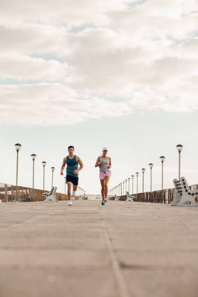 istock Young couple on morning run 641300818