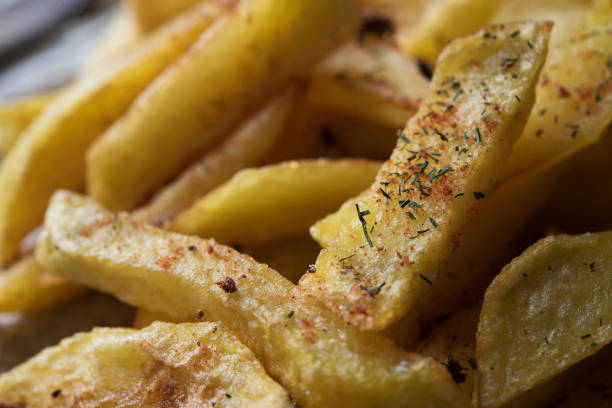istock French fries on dark background 641300984