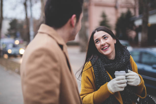 istock Young couple talking on the street 641301190