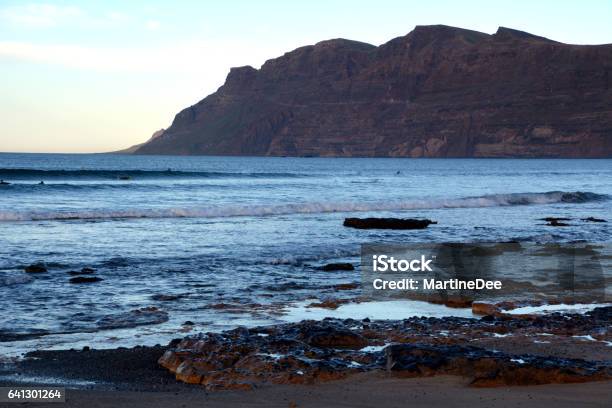 Landscape From Caleta De Famara El Risco Mountain On Lanzarote Canary Islands Spain Stock Photo - Download Image Now