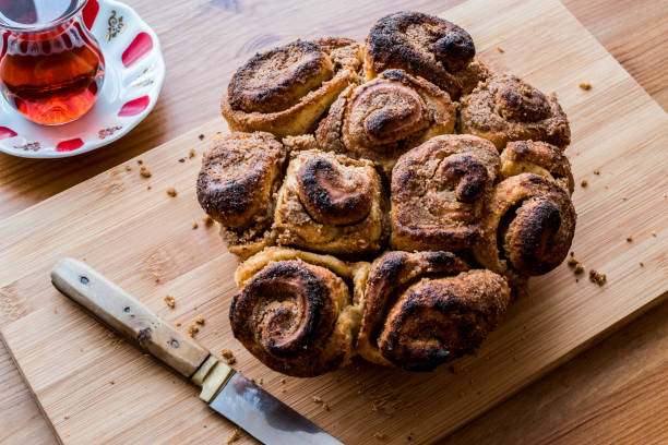 istock Turkish Hashasli corek / Pastry with poppy seeds and tea 641302476