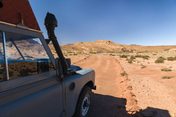 Four by 4 oldtimer driving off road in Morocco stock photo