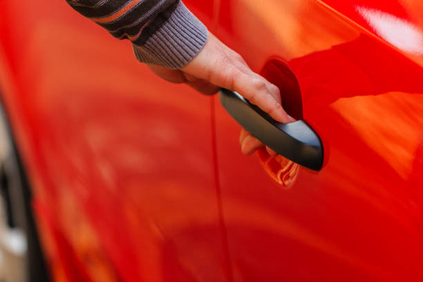 istock Opening the car door 641307852