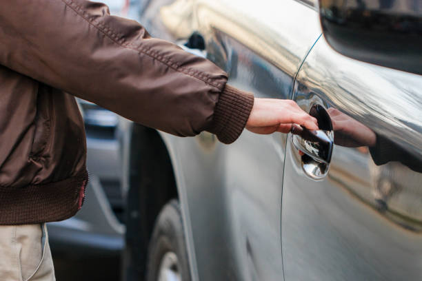istock Opening the car door 641308264