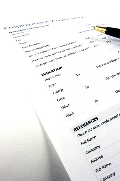 istock Blank employment application with a pen on the form 641309530