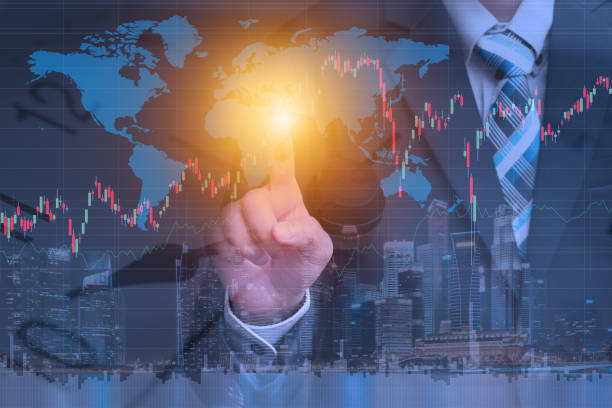 istock Businessman using techology to check worldwide market stock data 641311150