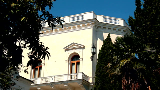 Arched window and balcony letgim day. Yalta. Crimea.
