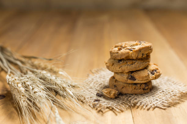 istock Chocolate cookies on a cloth sack on wood. 641320754