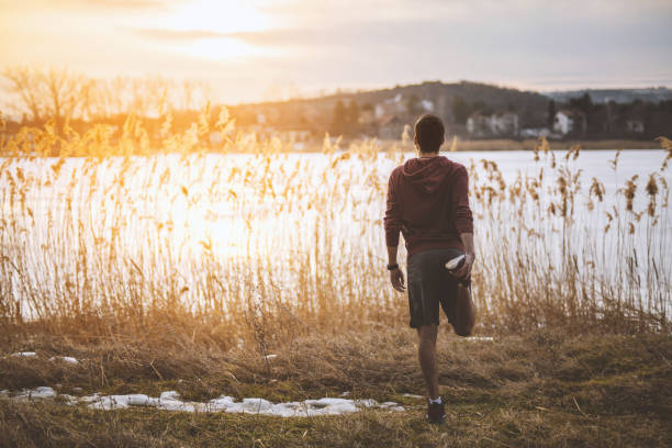 istock Stretching by the frozen lake 641322254