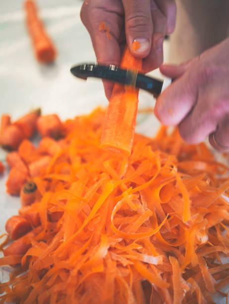 istock Healthy Eating. Peeling Carrots 641322622