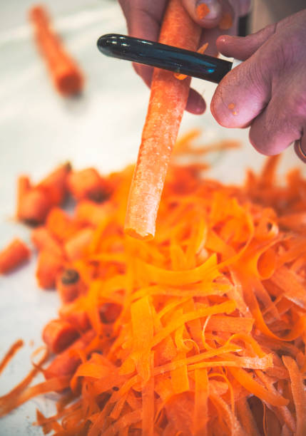 istock Healthy Eating. Peeling Carrots 641322738