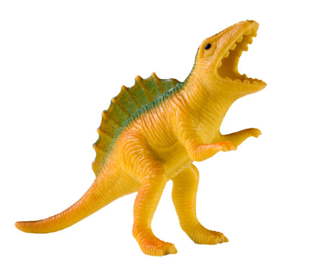 istock plastic dinosaur toy isolated on white background 641323324