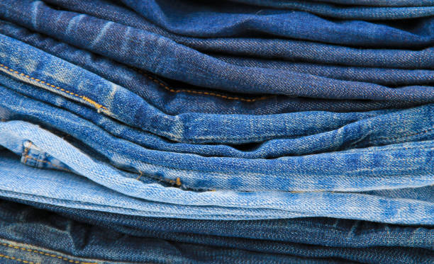 istock Stack of the blue jeans close-up 641326126