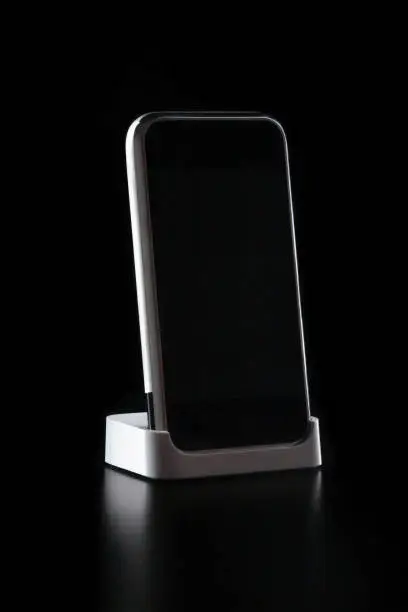 Photo of A Phone standing on Black Background