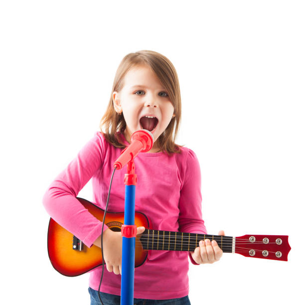 istock Happy little girl singing 641327992