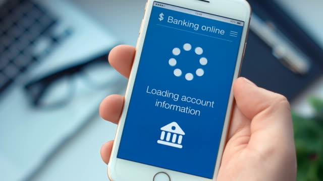 Checking bank account on banking app on the smartphone