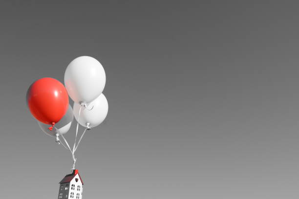 istock House tied  to helium balloon 641330106