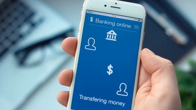 Sending money on banking app on the smartphone