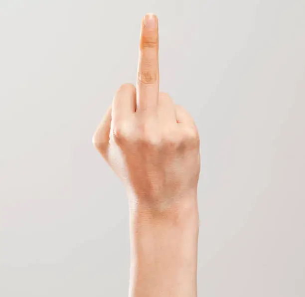 Photo of Woman hand showing middle finger