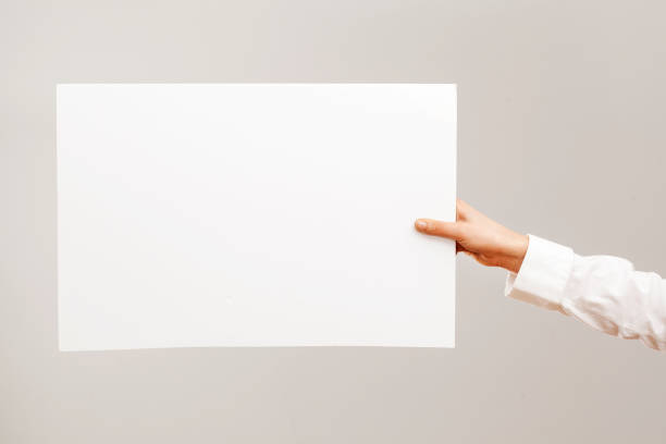 istock Young woman hand holding cardboard 641330666