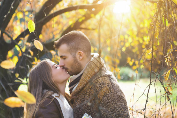 istock young couple kissing 641333984