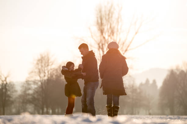 istock Family enjoying sunny winter days 641339512
