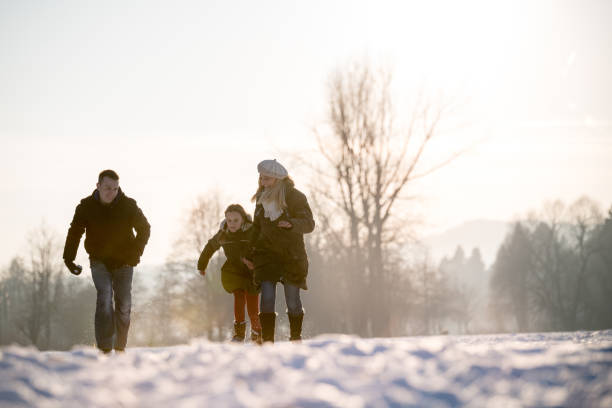 istock Family enjoying sunny winter days 641339528
